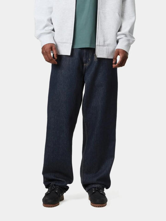 Image of a model wearing Pants. Productname: Carhartt Wip Single Knee Pants in Blue colour by brand - Carhartt Wip