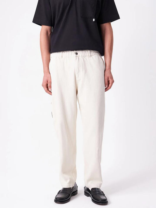 Image of a model wearing Pants. Productname: Article One Bentley Carpenter in Ecru colour by brand - Article One