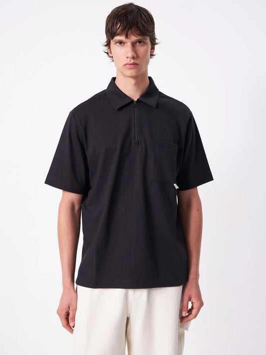 Image of a model wearing Tops. Productname: Article One Charlie Boxy Polo in Midnight colour by brand - Article One