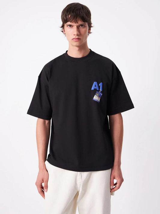 Image of a model wearing Tops. Productname: Article One Still On Vacay Tee in Black colour by brand - Article One