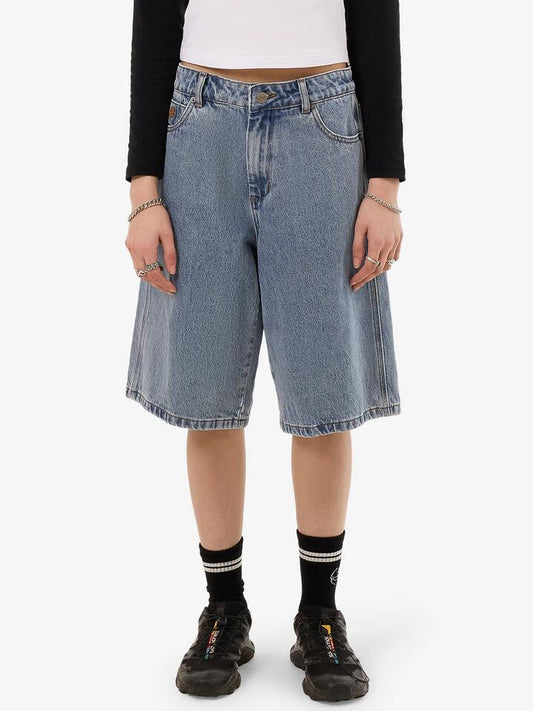 Image of a model wearing Shorts. Productname: Worship Going Nuts Big Baggy Short in Rage Blue colour by brand - Worship