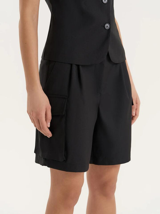 Image of a model wearing Shorts. Productname: 4th & Reckless Devon Short in Black colour by brand - 4th & Reckless