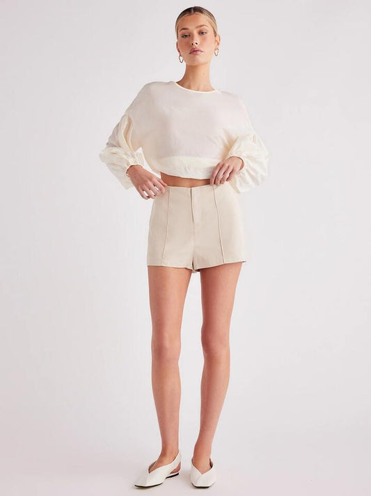 Image of a model wearing Tops. Productname: SNDYS Kassie Top in Offwhite colour by brand - SNDYS