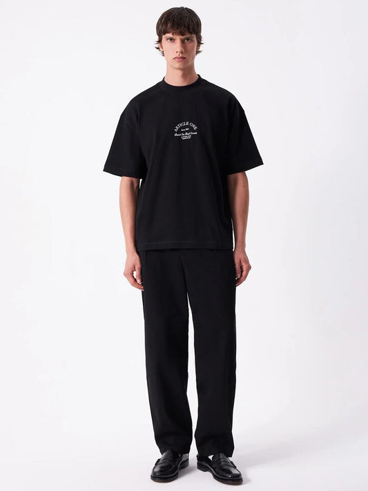 Image of a model wearing Tops. Productname: Article One Society Tee in Black colour by brand - Article One