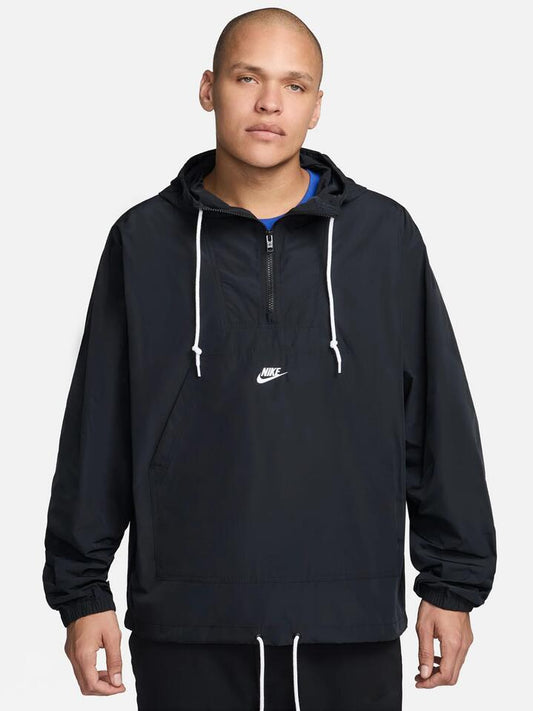Image of a model wearing Outerwear. Productname: Nike Club Marina Anorak Jacket in Black/White colour by brand - Nike