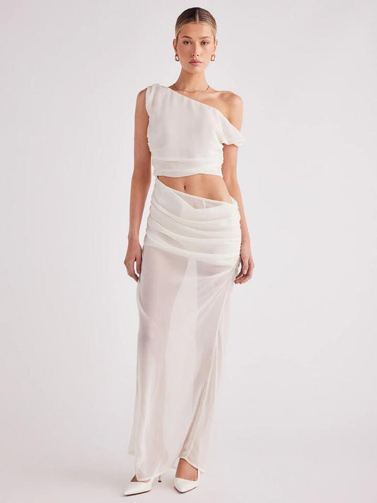 Image of a model wearing Dress. Productname: SNDYS Kilee Maxi Dress in Offwhite colour by brand - SNDYS