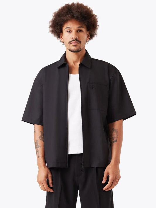Image of a model wearing Outerwear. Productname: Zanerobe Boxy Overshirt in Black colour by brand - Zanerobe
