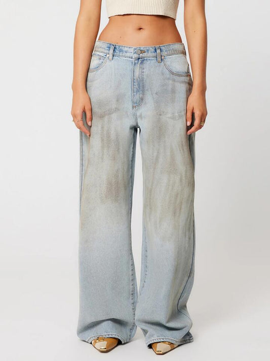 Image of a model wearing Denim. Productname: Abrand 95 Mid Super Baggy Nicky in Tint Light Blue colour by brand - Abrand