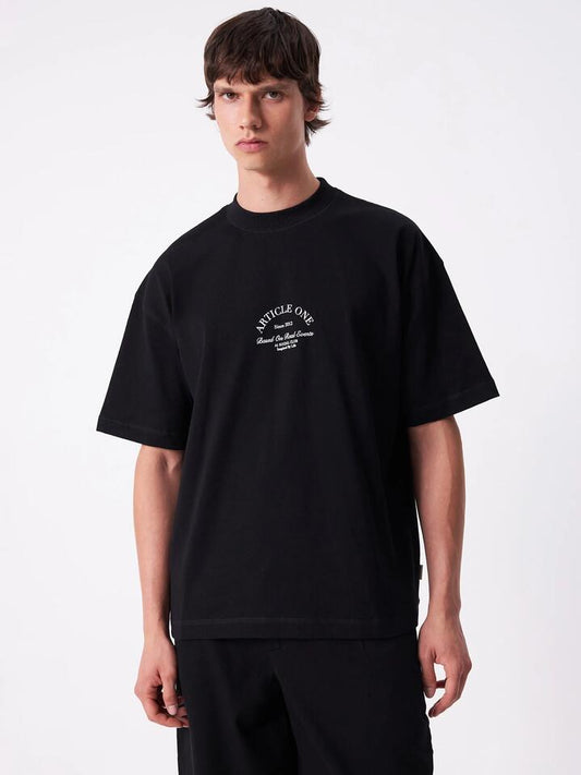 Image of a model wearing Tops. Productname: Article One Society Tee in Black colour by brand - Article One