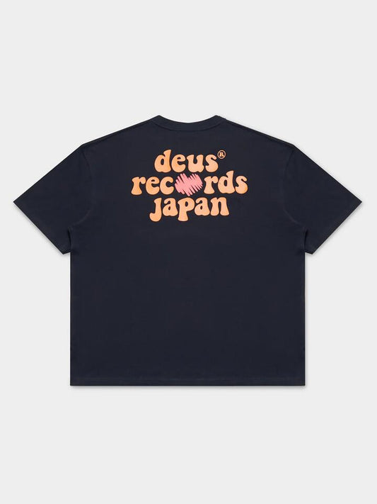 Image of a model wearing Tops. Productname: Deus Thumper Tee in Black colour by brand - Deus