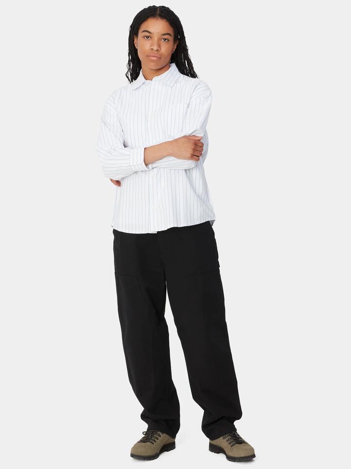 Image of a model wearing Pants. Productname: Carhartt Wip Brandon Double Knee Pant in Black colour by brand - Carhartt Wip