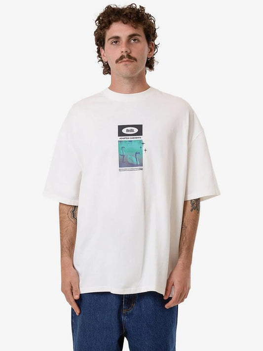 Image of a model wearing Tops. Productname: Thrills Sweet Anarchy Box Fit Oversize Tee in Dirty White colour by brand - Thrills