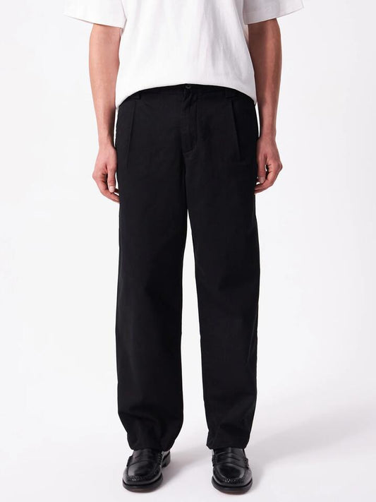 Image of a model wearing Pants. Productname: Article One Utility Chino in Black colour by brand - Article One