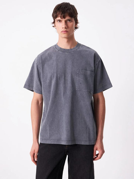 Image of a model wearing Tops. Productname: Article One Sayo Pocket Tee in Cement colour by brand - Article One