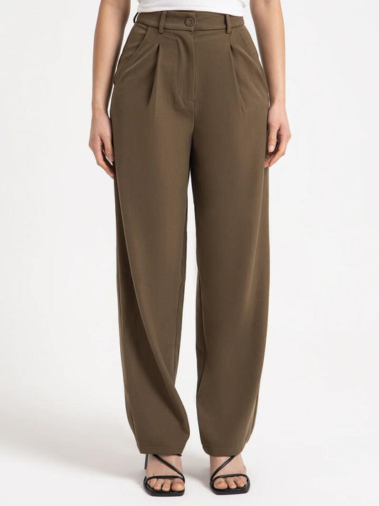 Image of a model wearing Pants. Productname: Beyond Her Hart Tailored Pants in Khaki colour by brand - Beyond Her
