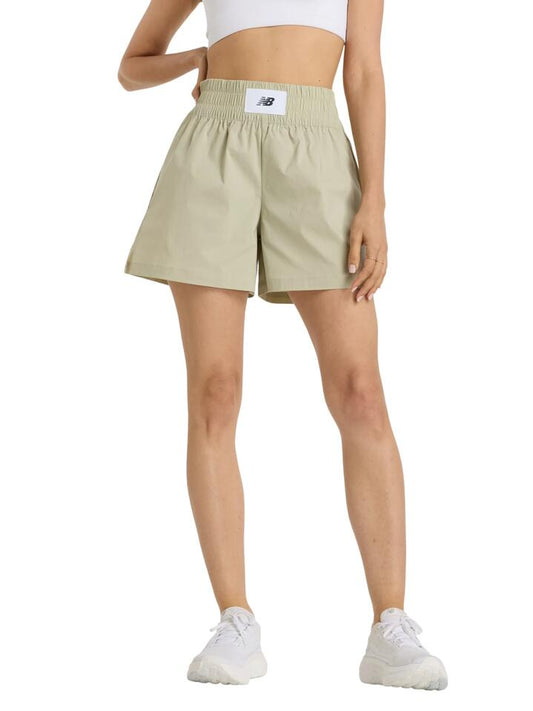 Image of a model wearing Shorts. Productname: New Balance Pull On Boxer Short in Olivine colour by brand - New Balance