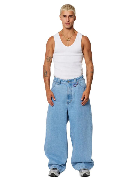 Image of a model wearing Denim. Productname: Abrand A7 Mega Baggy Dodd in BLEACHED VINTAGE INDIGO colour by brand - Abrand