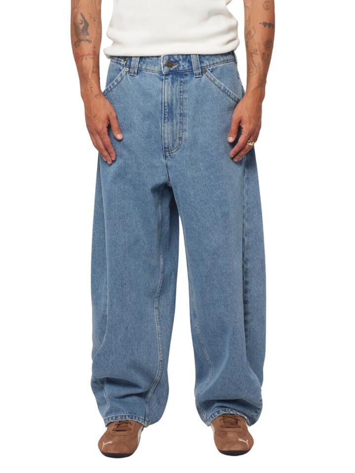 Image of a model wearing Denim. Productname: Abrand A6 Big Cocoon Francis in Mid Blue colour by brand - Abrand