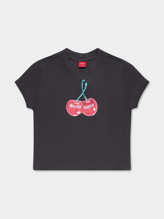 Image of a model wearing Tops. Productname: Worship Cherio Teeny Tee in WORN BLACK colour by brand - Worship