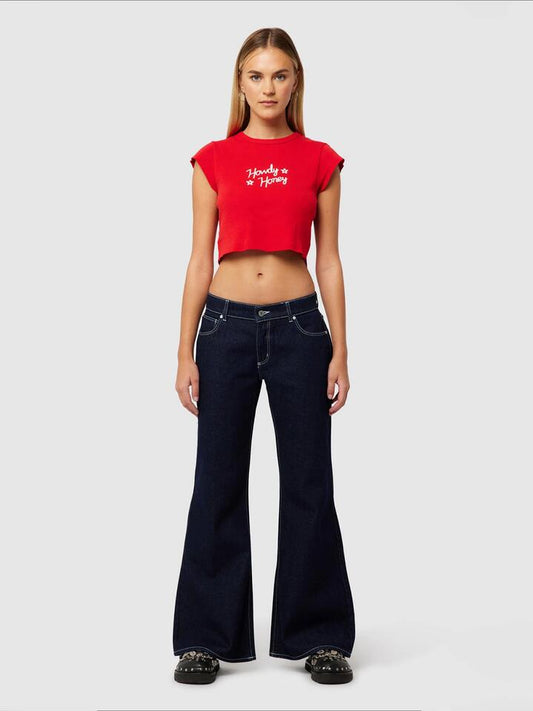 Image of a model wearing Denim. Productname: Abrand 99 Low Baggy Flare Nicky in Rinse Denim colour by brand - Abrand