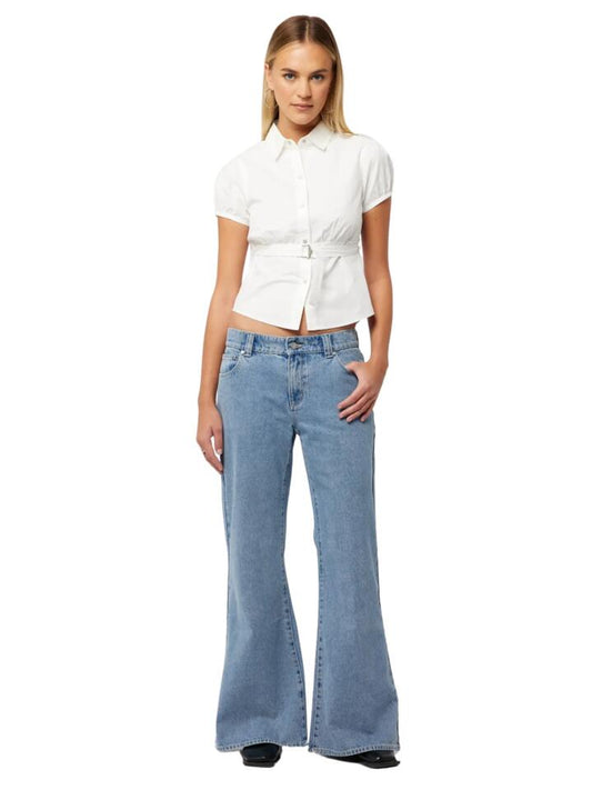 Image of a model wearing Denim. Productname: Abrand 99 Low Baggy Flare Paris in Mid Blue colour by brand - Abrand