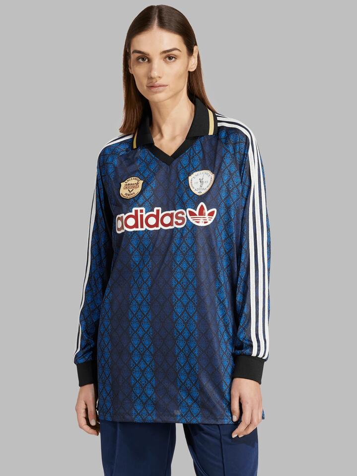 Image of a model wearing Tops. Productname: Adidas Long Sleeve Jersey in Black/Night Indigo colour by brand - Adidas