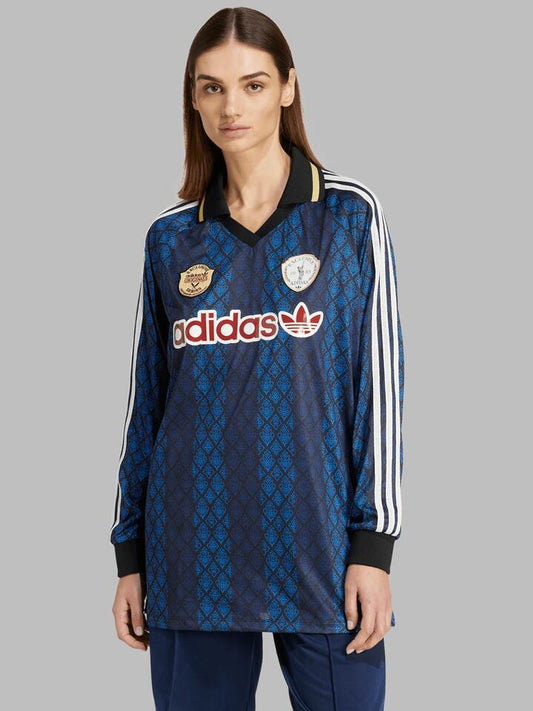 Image of a model wearing Tops. Productname: Adidas Long Sleeve Jersey in black/night indigo colour by brand - Adidas