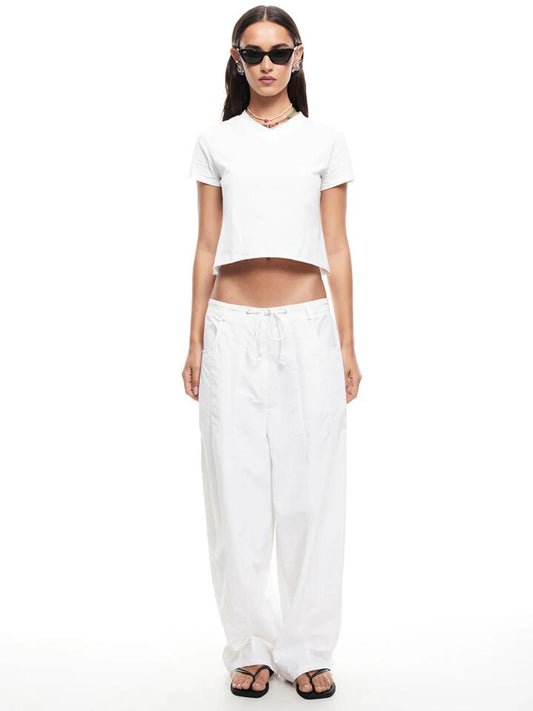 Image of a model wearing Pants. Productname: Lioness Riptide Pant in Foam colour by brand - Lioness