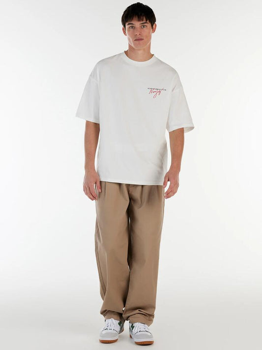Image of a model wearing Tops. Productname: Nana Judy Bennett Tee in White colour by brand - Nana Judy