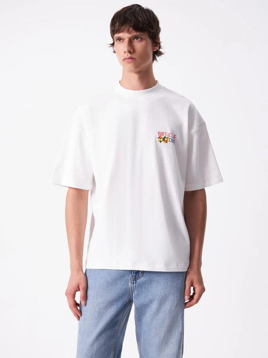 Image of a model wearing Tops. Productname: Article One Holiday Tee in White colour by brand - Article One