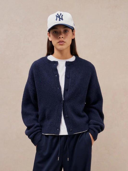 Image of a model wearing Outerwear. Productname: MSE Cosy Crew Cardigan in Navy colour by brand - MSE