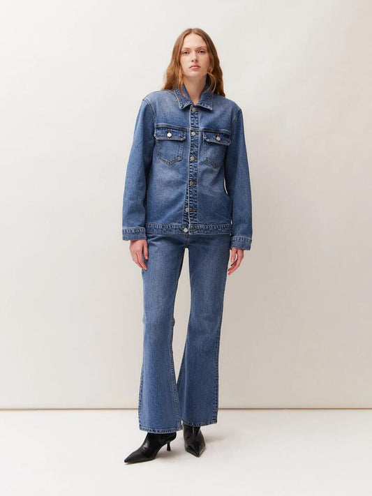 Image of a model wearing Denim. Productname: Lulu & Rose Freja Bootcut Jean in Classic Blue colour by brand - Lulu & Rose