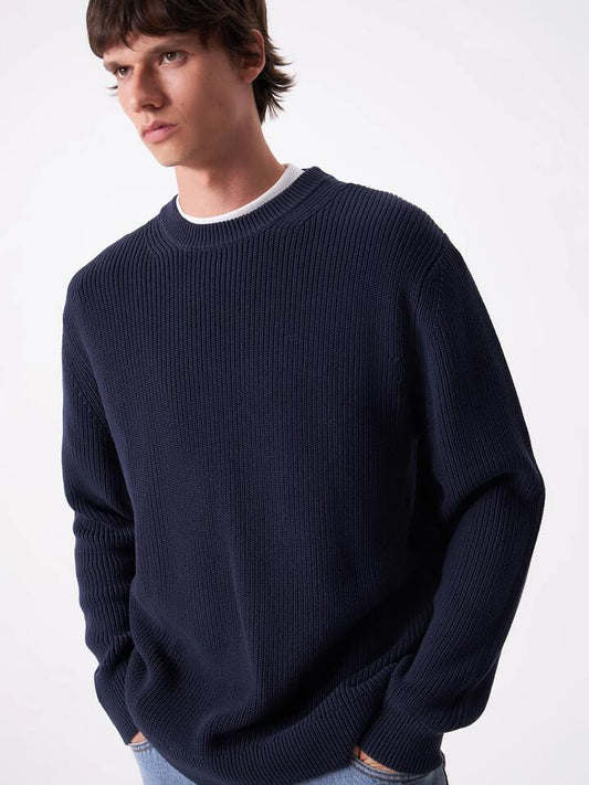 Image of a model wearing Outerwear. Productname: Article One Rib Knit Sweater in Navy colour by brand - Article One