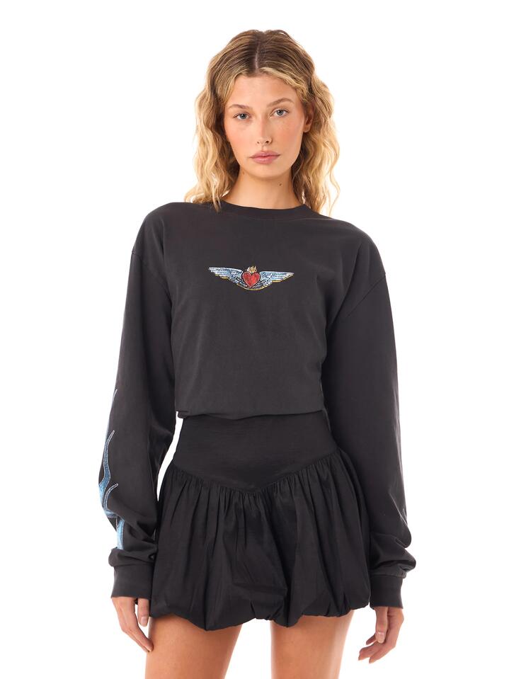 Image of a model wearing Tops. Productname: Felle Bondi Lovers Long Sleeve Moto in Washed Black colour by brand - Felle