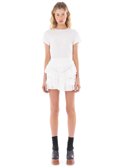 Image of a model wearing Skirts. Productname: Felle Mini Frill Skirt in Off White colour by brand - Felle