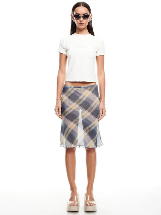 Image of a model wearing Tops. Productname: Lioness Bisou Tee in Onyx colour by brand - Lioness