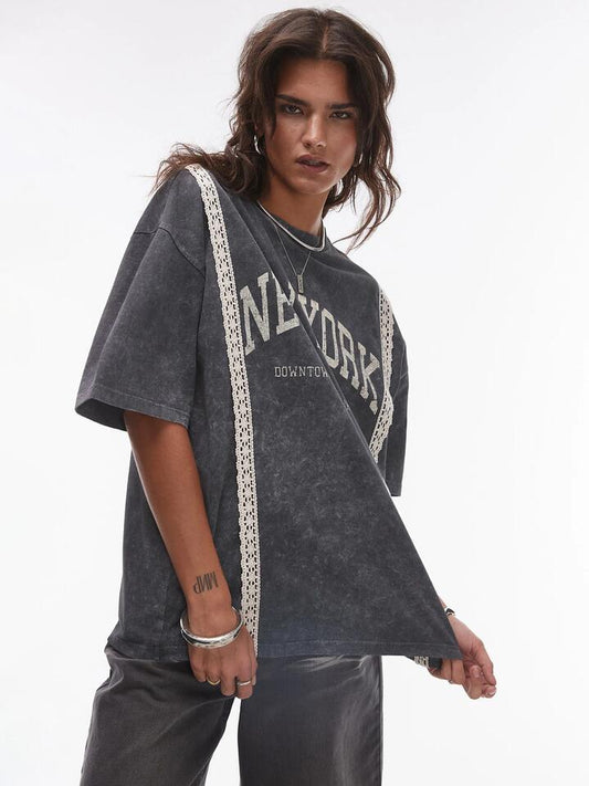 Image of a model wearing Tops. Productname: Topshop New York Lace Trim Oversized Tee in DARK GREY colour by brand - Topshop
