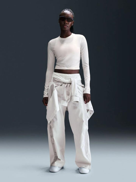 Image of a model wearing Tops. Productname: Nike Nike Sportswear Chill Knit in Sail/Sail colour by brand - Nike