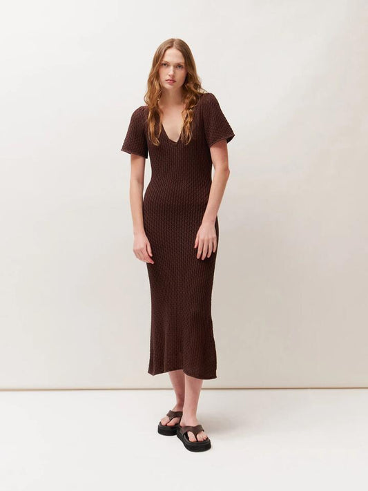 Image of a model wearing Dress. Productname: Lulu & Rose Isabella Midi Dress in Chestnut colour by brand - Lulu & Rose