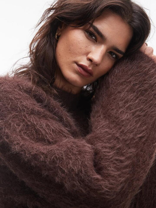 Image of a model wearing Outerwear. Productname: Topshop Knitted Ultra Fluffy Eyelash Slouchy Jumper in CHOCOLATE colour by brand - Topshop