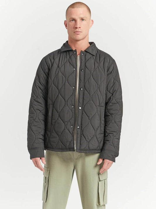 Image of a model wearing Outerwear. Productname: Article One Lido Quilted Jacket in Black colour by brand - Article One