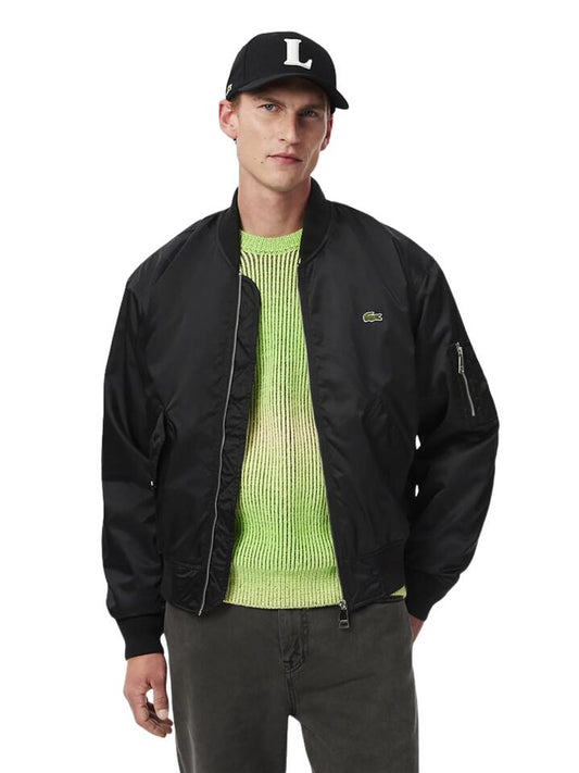 Image of a model wearing Outerwear. Productname: Lacoste Essential Tech Twill Bomber Jacket in BLACK colour by brand - Lacoste