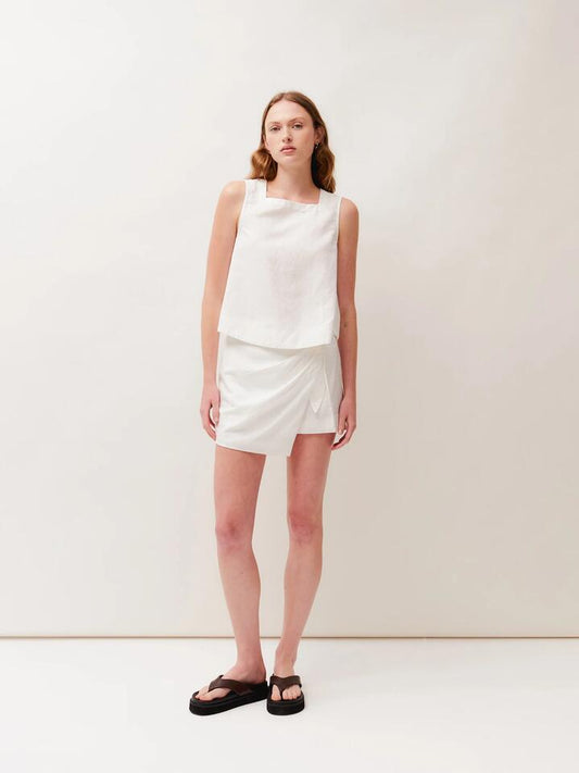 Image of a model wearing Skirts. Productname: Lulu & Rose Priya Wrap Skirt in Off White colour by brand - Lulu & Rose
