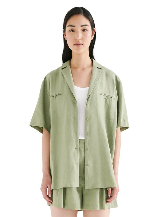 Image of a model wearing Tops. Productname: Nude Lucy Thilda Linen Shirt in Sage colour by brand - Nude Lucy