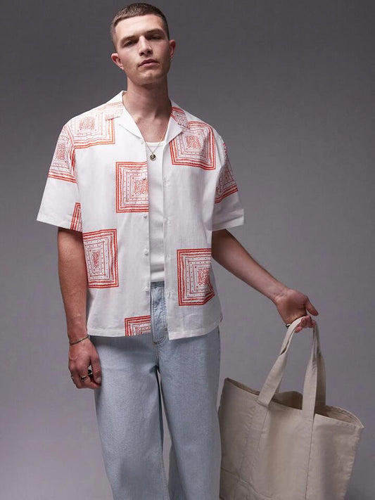 Image of a model wearing Tops. Productname: Topman Revere Printed Shirt in White colour by brand - Topman
