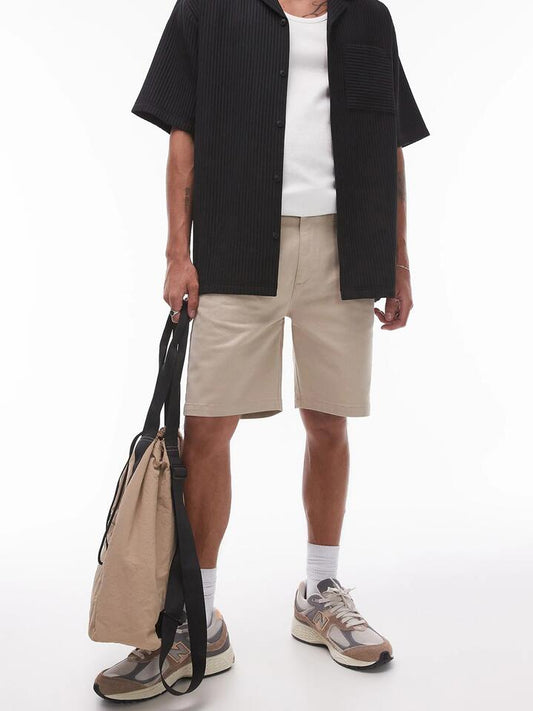 Image of a model wearing Pants. Productname: Topman Slim Chino Shorts in Stone colour by brand - Topman