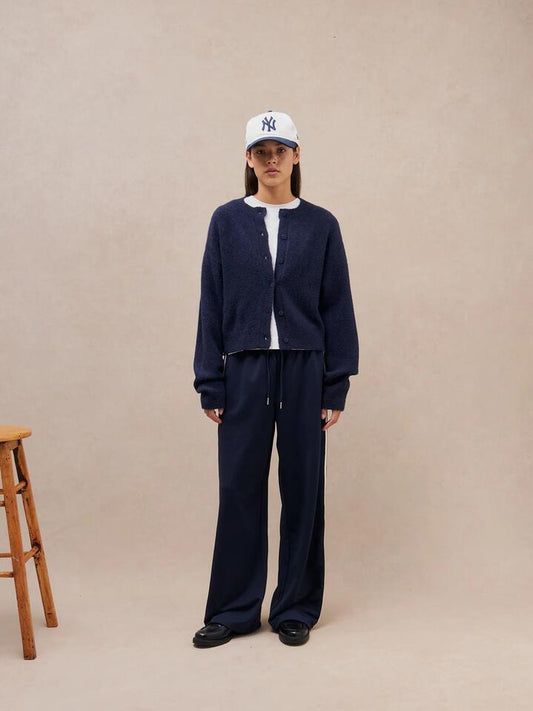 Image of a model wearing Pants. Productname: MSE Drawstring Track Pant in Navy Stripe colour by brand - MSE