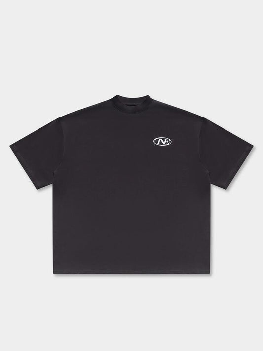 Image of a model wearing Tops. Productname: TNE Timeless Tee in Faded Black colour by brand - TNE