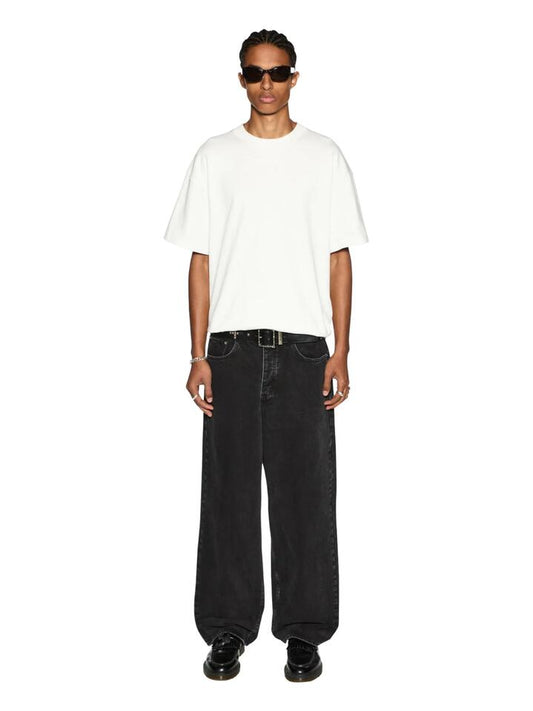 Image of a model wearing Denim. Productname: Ksubi Maxx in Noir colour by brand - Ksubi