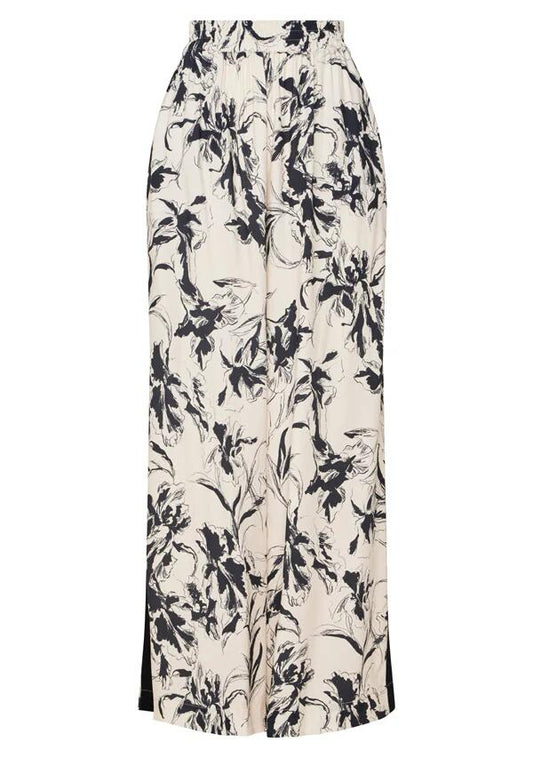 Image of a model wearing Pants. Productname: Lis Wide Leg Pants in Lis Print colour by brand - MOS The Label